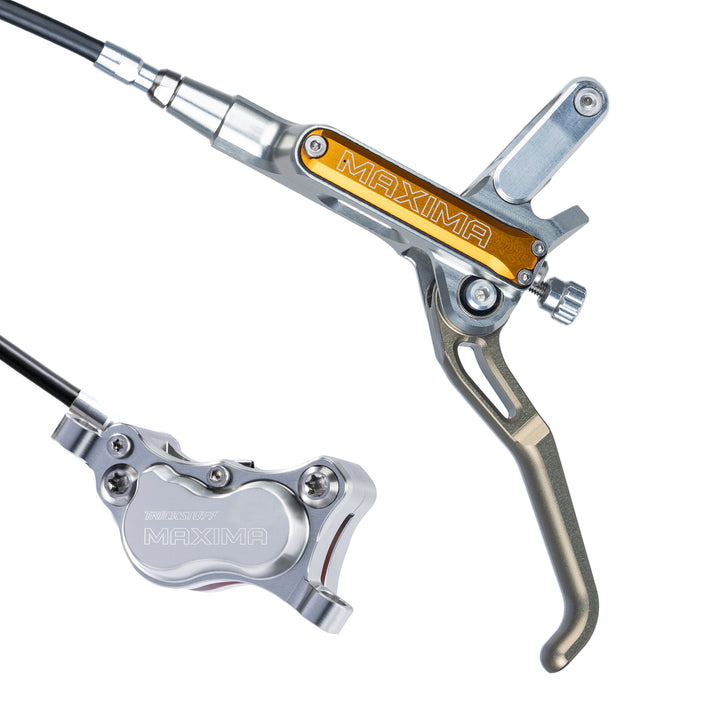 Brakeset Trickstuff Maxima | Pump Silver / Reservoir Orange / Lever Neutral / Calliper Silver / Kevlar Black Hose / Pump Straight Silver / Calliper Banjo Silver